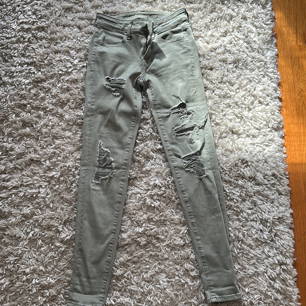 Light green ripped jeans